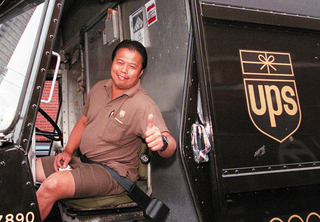 UPS driver Luis Tendero breaks out the shorts in Eugene, OR.